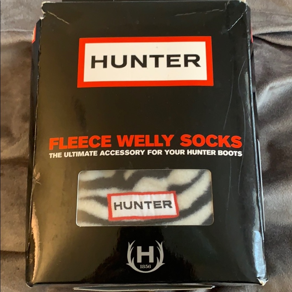 Never worn Zebra Print Fleece Hunter Boot Socks.